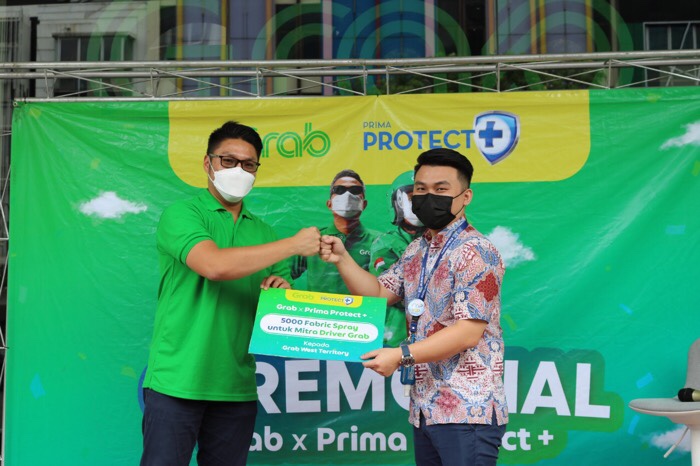 Grab Indonesia-OT Group Serukan Masyarakat Disiplin Prokes